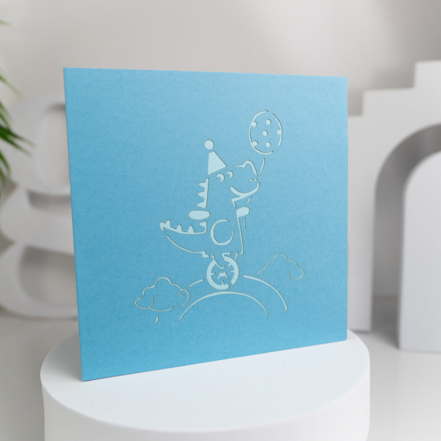 Crocodile with Balloon Riding Unicycle Birthday Pop-up Card