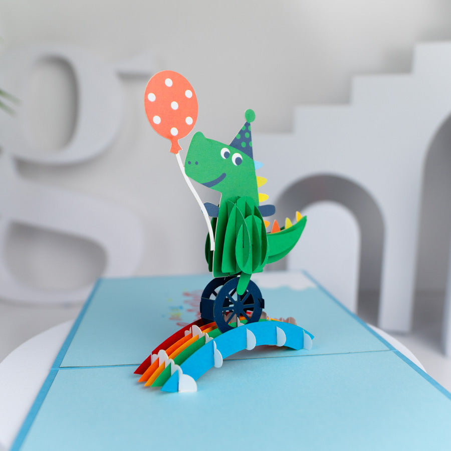 Crocodile with Balloon Riding Unicycle Birthday Pop-up Card