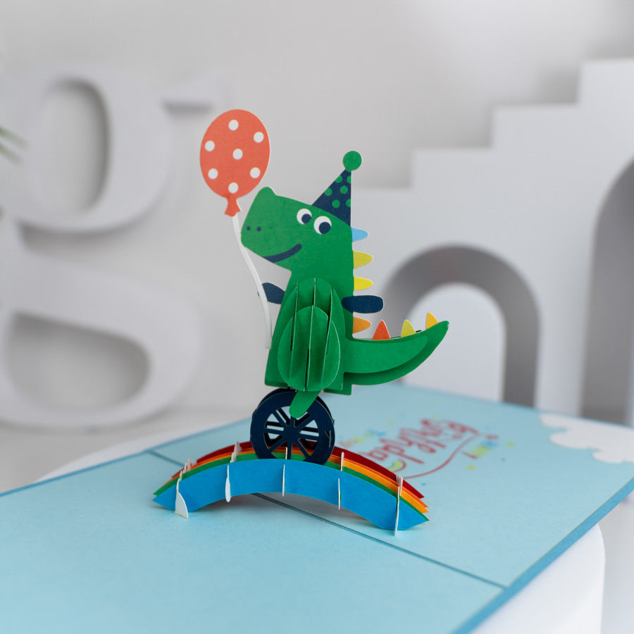 Crocodile with Balloon Riding Unicycle Birthday Pop-up Card