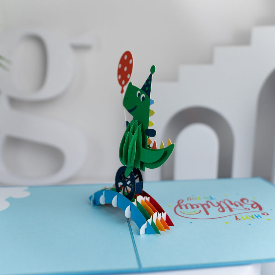 Crocodile with Balloon Riding Unicycle Birthday Pop-up Card