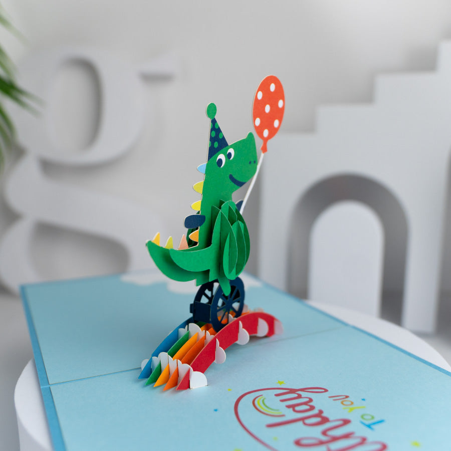 Crocodile with Balloon Riding Unicycle Birthday Pop-up Card